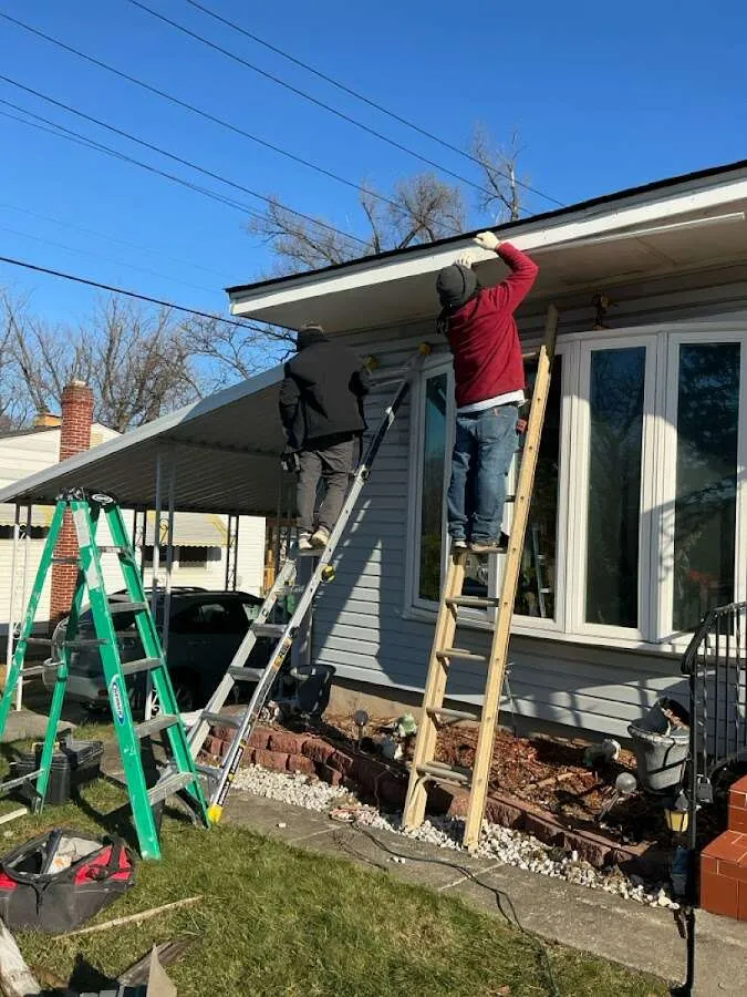 Restoration crew performing exterior repair in Westland