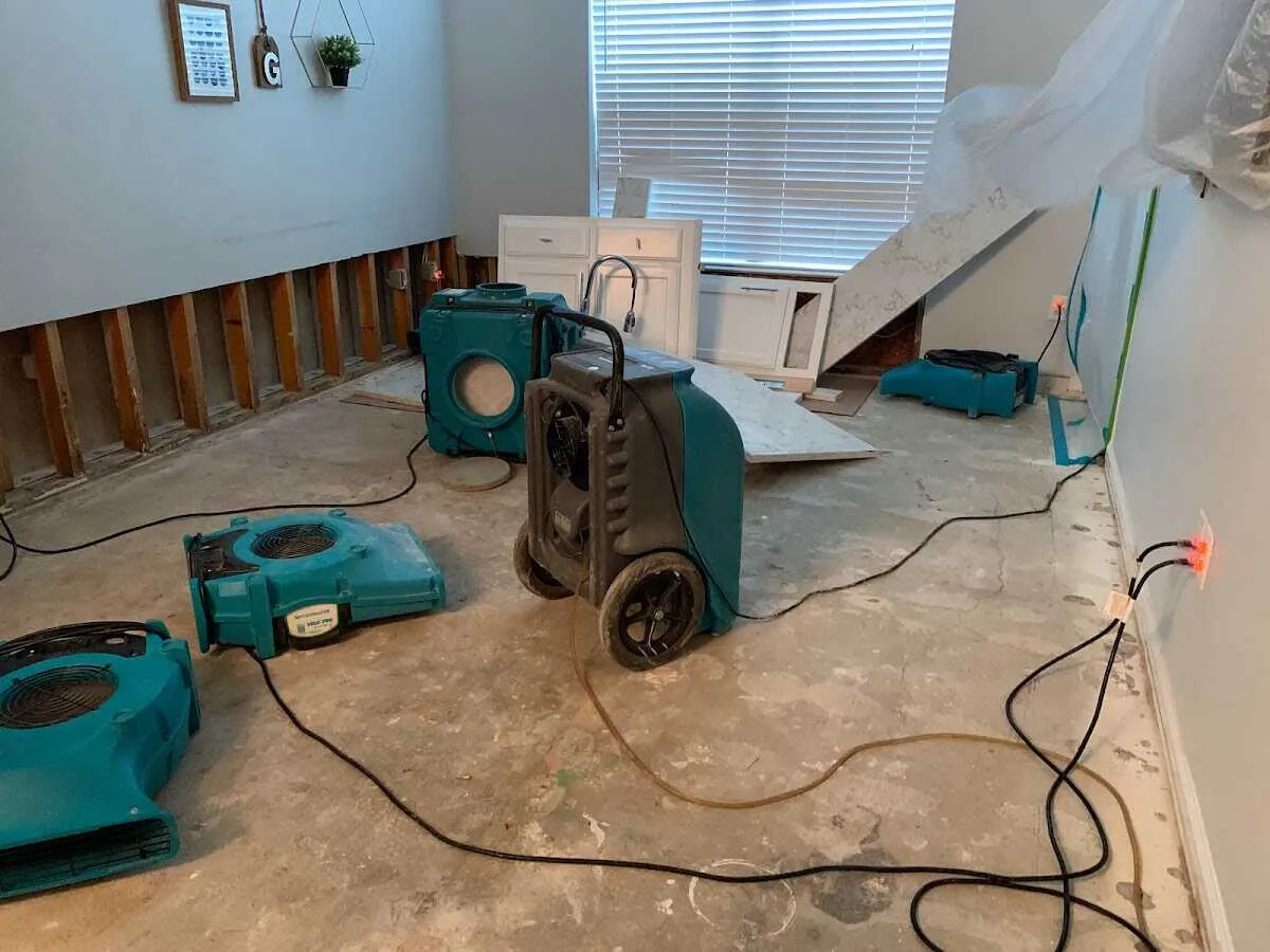 Dehumidifier in flood-cut room for Water Damage Restoration in Westland
